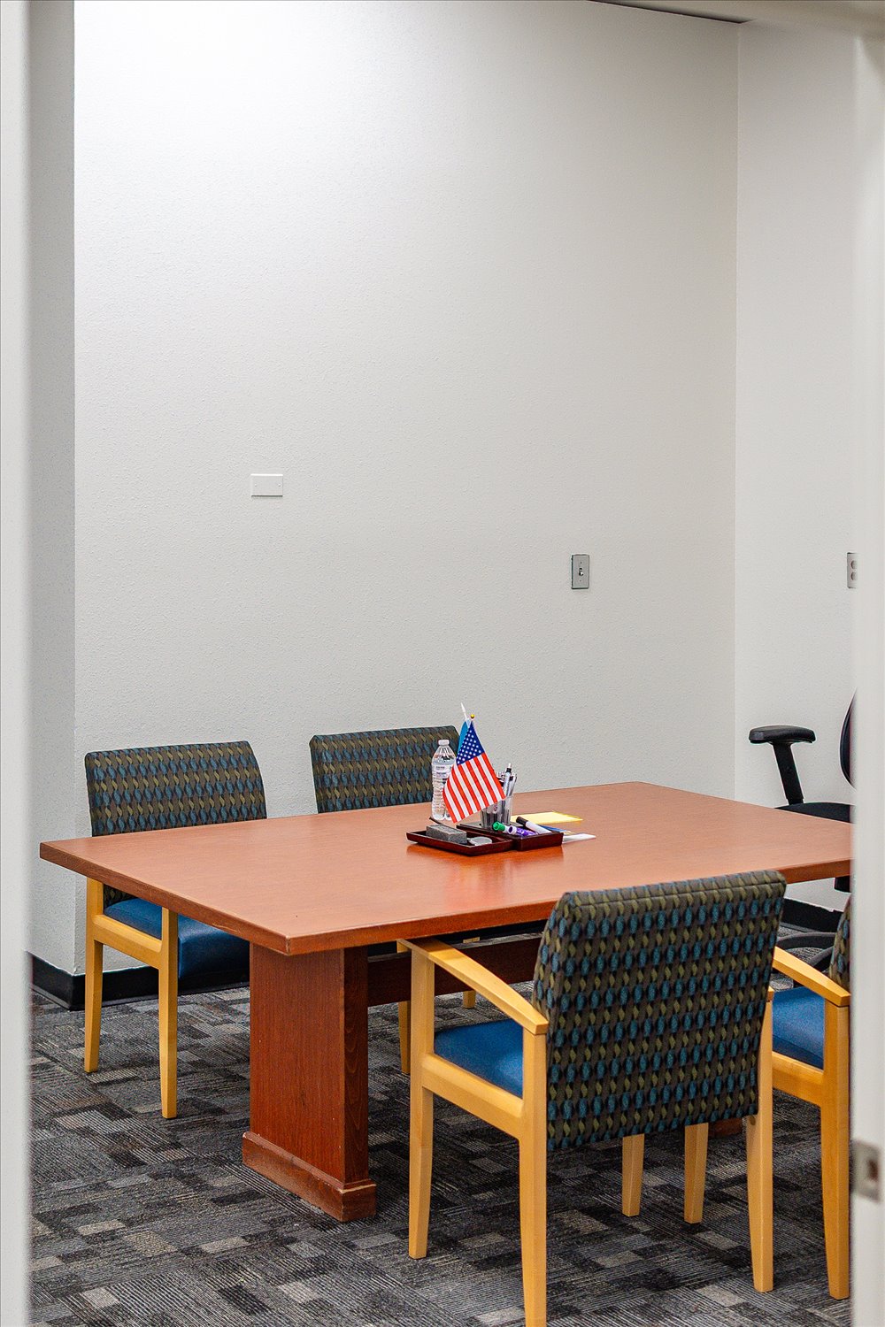 A small meeting room with a conference table, used for appointments at Spokane Slavic Association.