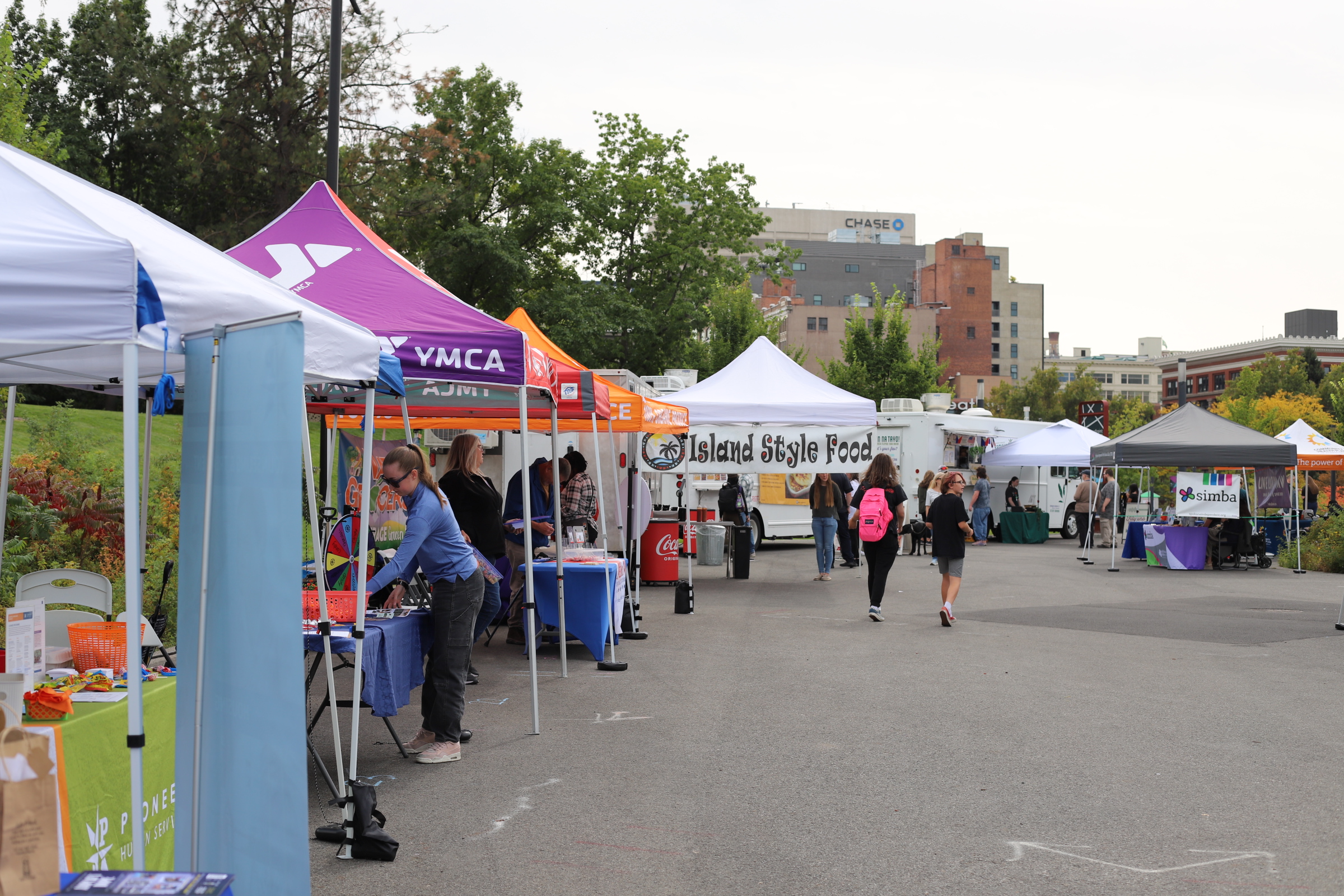 Rows of organization tents at the Hands Across Spokane community event.