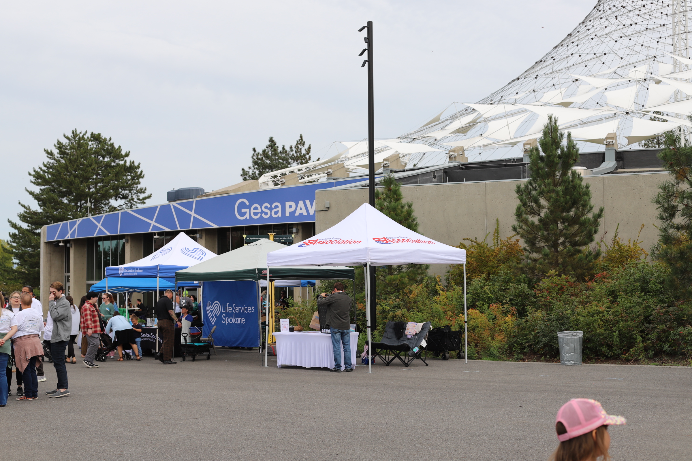 The Spokane Slavic Association tent set up alongside Life Services Spokane's tent at Hands Across Spokane, a community resource fair at Riverfront Park.
