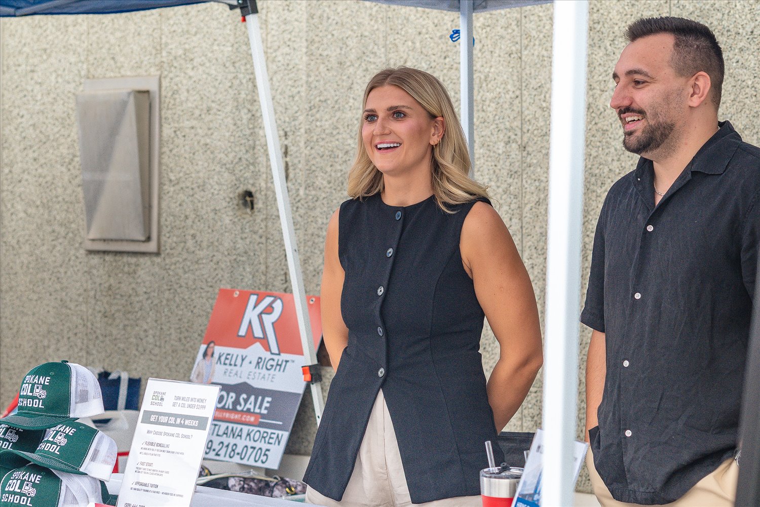 Two local business owners in conversation at an SSA community business event.
