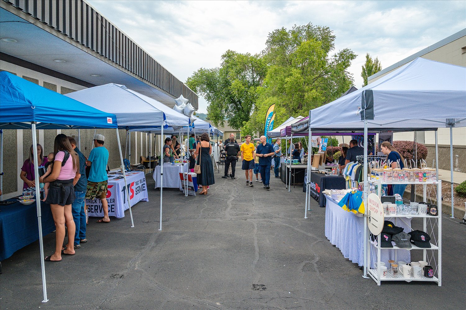 Community partner organization tents at an SSA outreach event.
