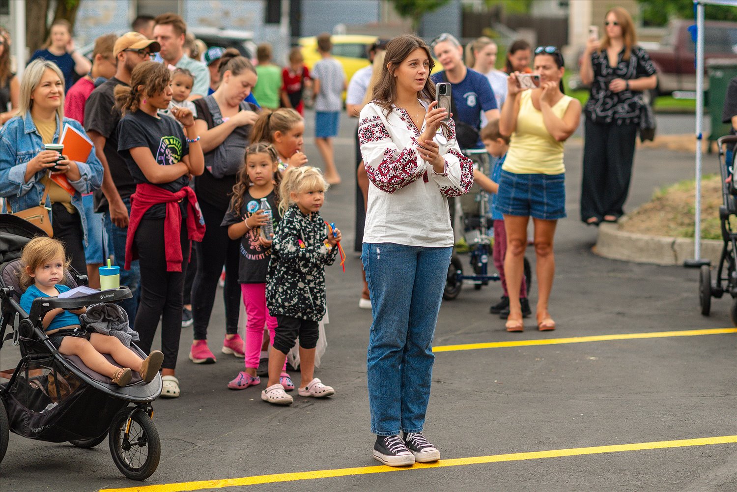 Community members, families and local business owners gathered at SSA's ribbon-cutting celebration.