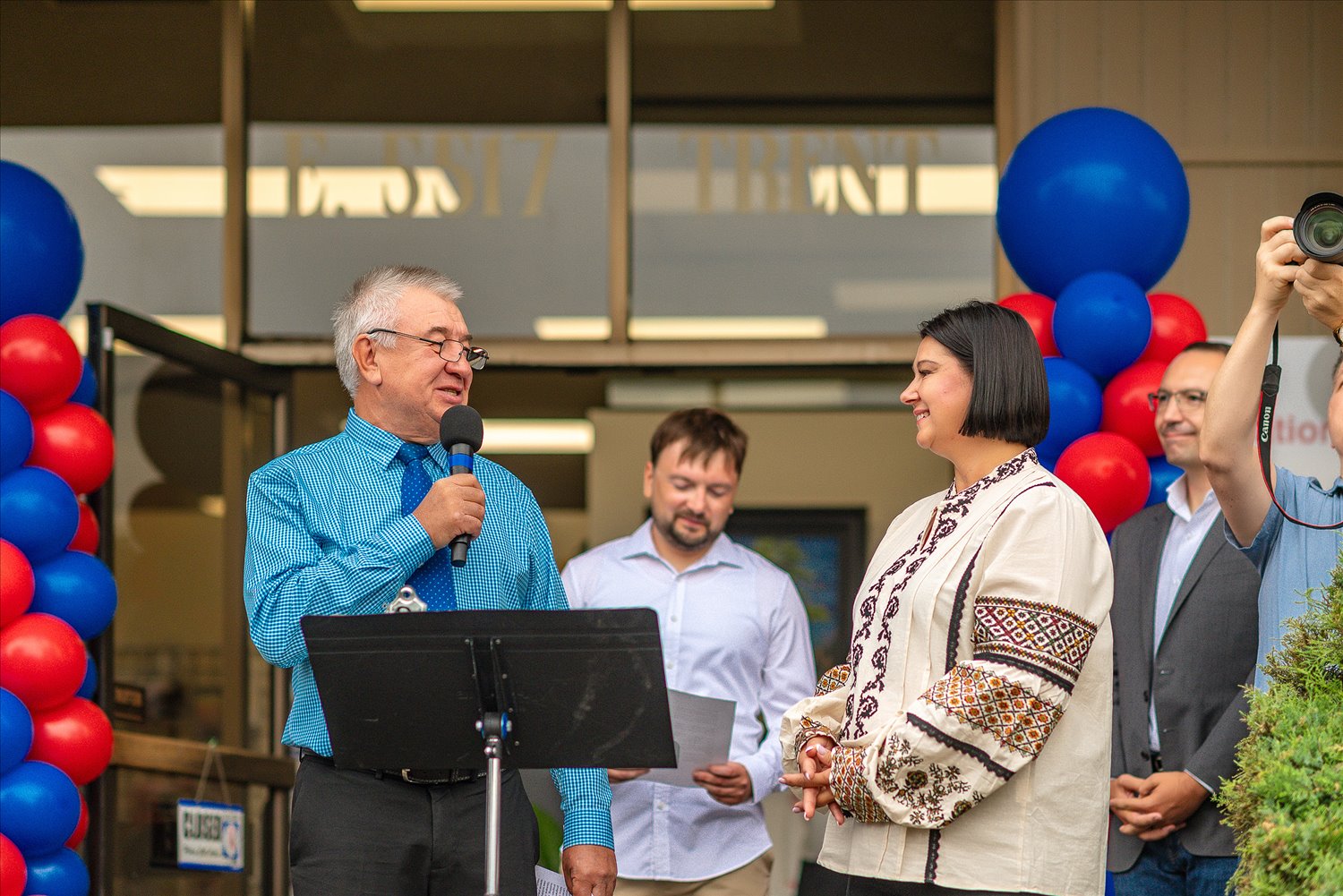 Community leaders celebrating the opening of an SSA location, marking a milestone in the organization's growth.
