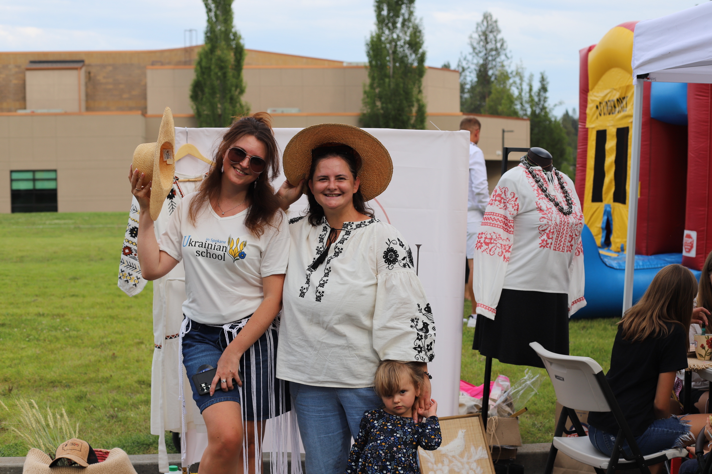 Families in embroidered shirts enjoy UA-Fest, an SSA community festival.