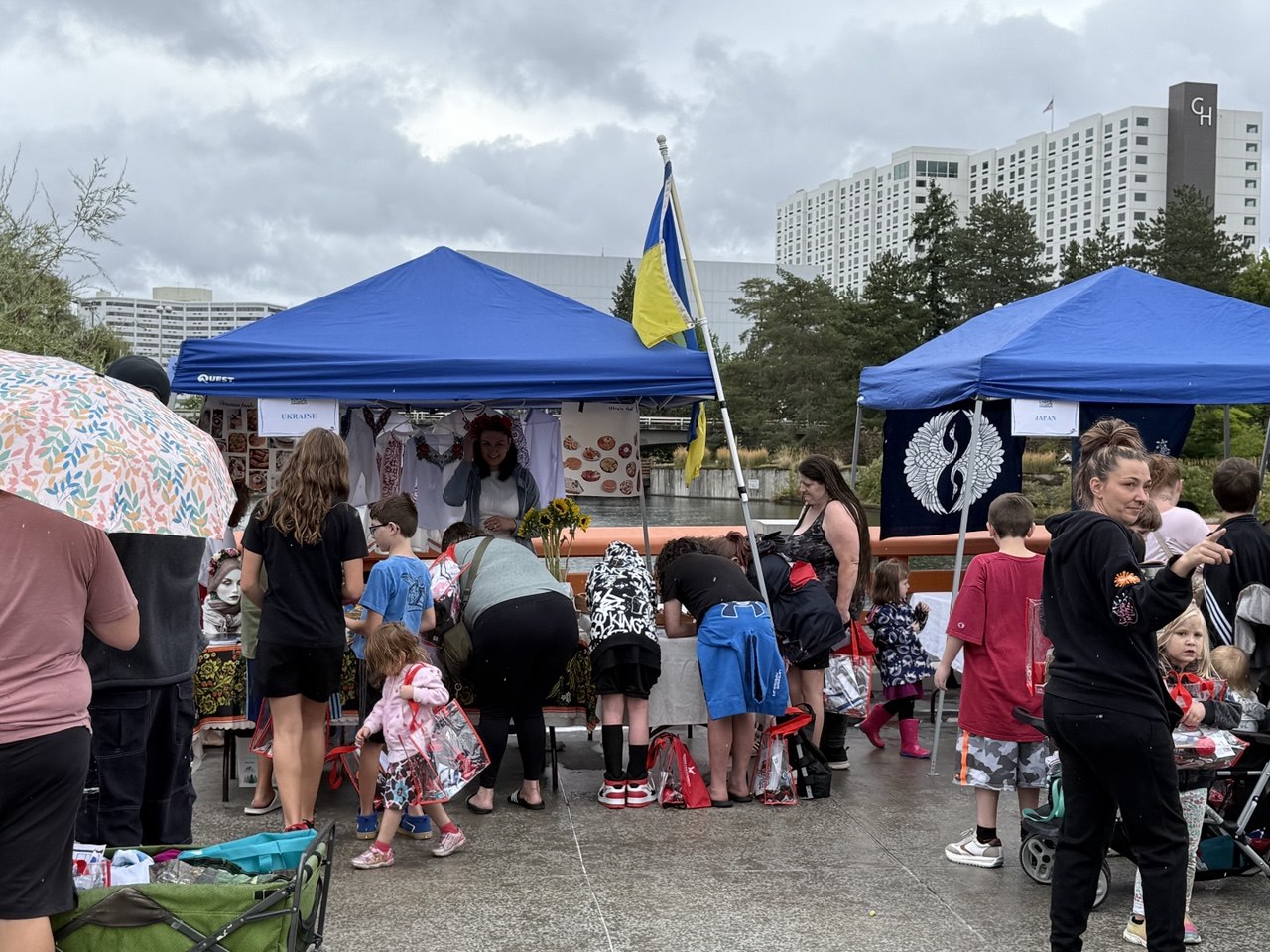 Community members gather under SSA's tent at Unity in the Community.